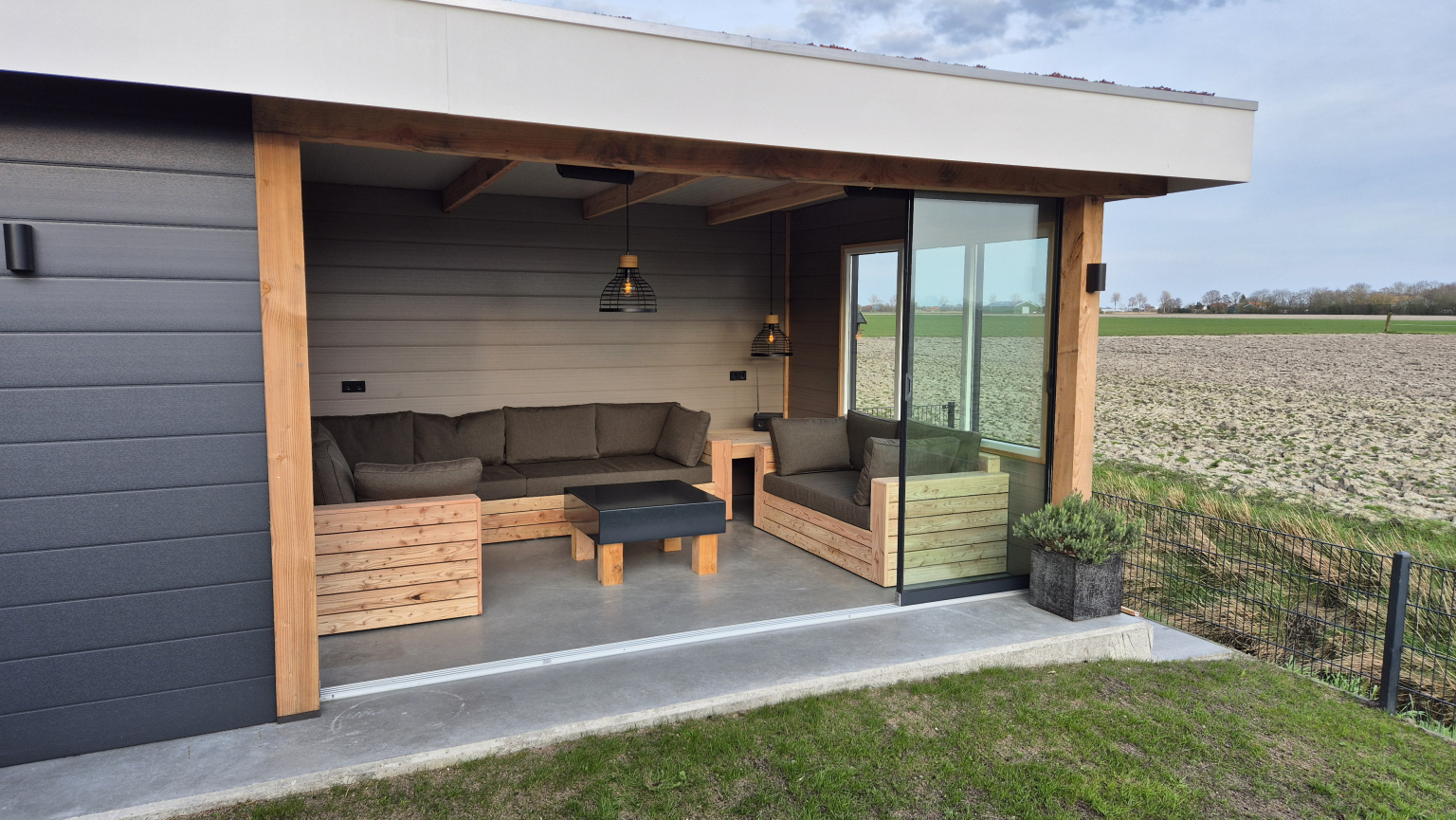 De tuinkamer met uitzicht over de weilanden