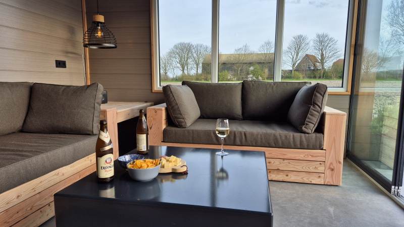 De loungebank in de tuinkamer